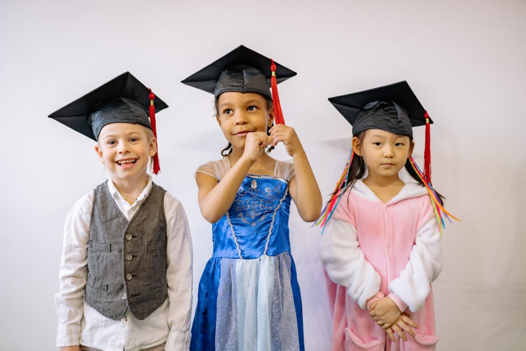 Applied Diversity Education: kids in cap and gown